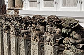 Bangkok Wat Arun - Detail of the precint of the sacred area of the ubosot. guarded by chinese lions. 